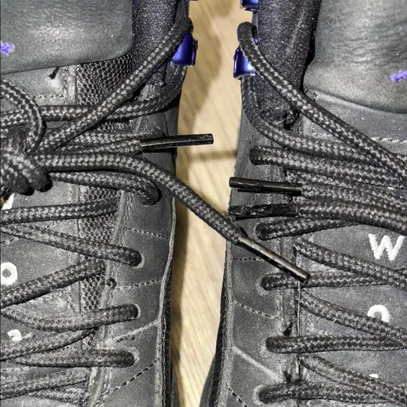 Big Boy Black and Purple Jordan 12s