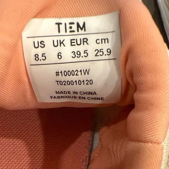 Gently worn Tiem size 8.5 slip on tennis shoes