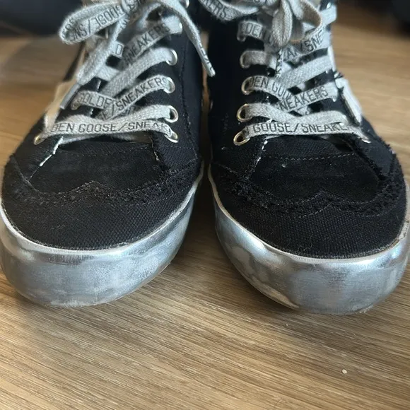 Golden Goose Black and White High-Top Sneakers