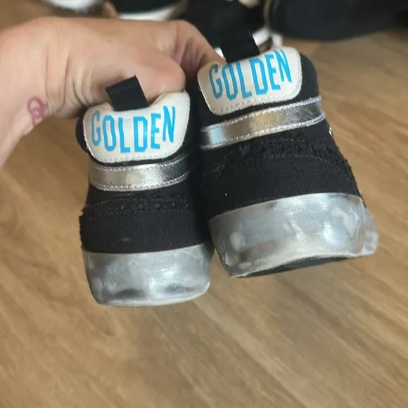 Golden Goose Black and White High-Top Sneakers