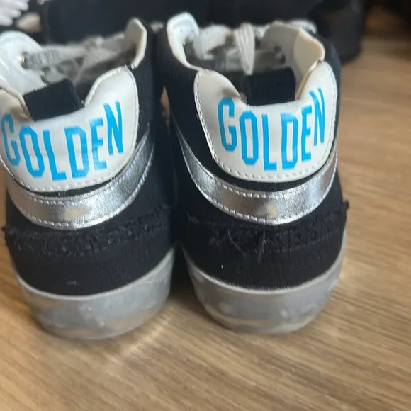 Golden Goose Black and White High-Top Sneakers