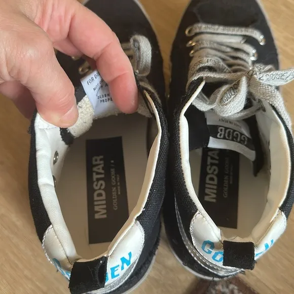 Golden Goose Black and White High-Top Sneakers