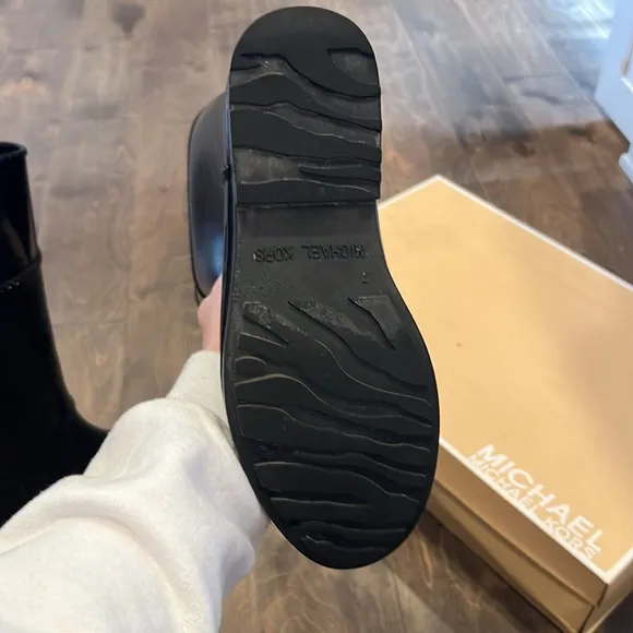Like new! Michael Kors women knew high rain boots. Size 7