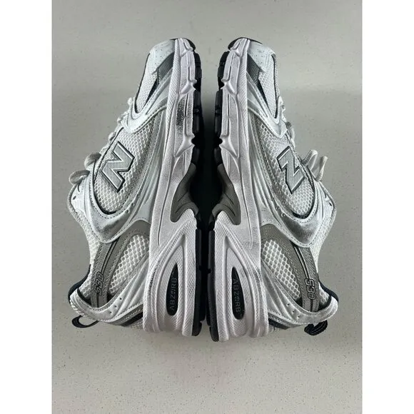 New Balance 530 Sneakers women's White distressed size 9