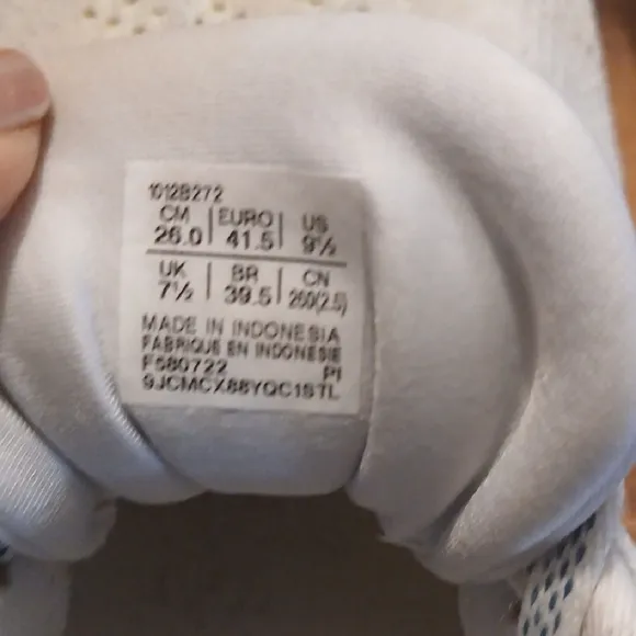 White and Yellow Athletic Shoes