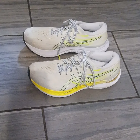White and Yellow Athletic Shoes