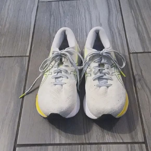 White and Yellow Athletic Shoes