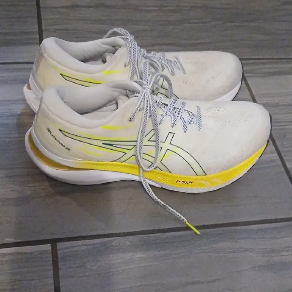 White and Yellow Athletic Shoes