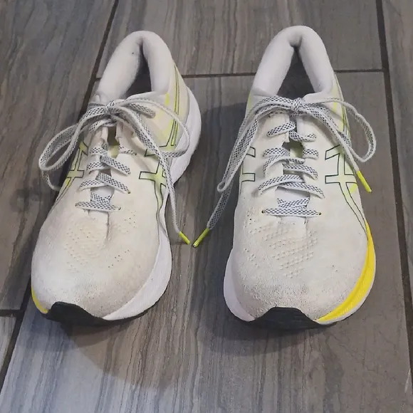 White and Yellow Athletic Shoes