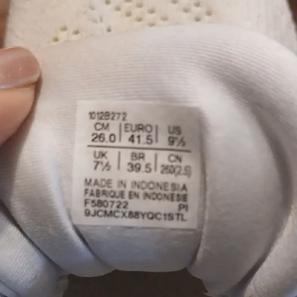 White and Yellow Athletic Shoes
