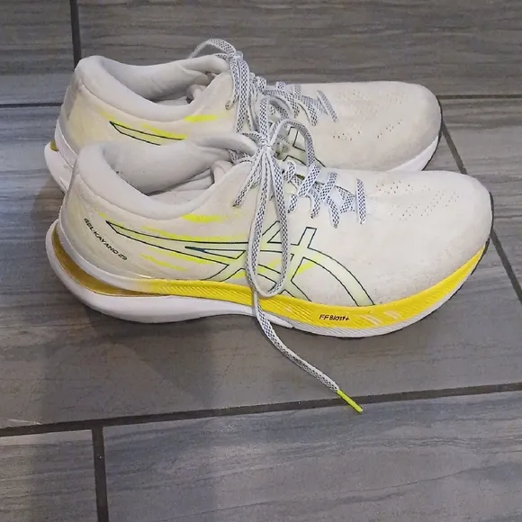 White and Yellow Athletic Shoes