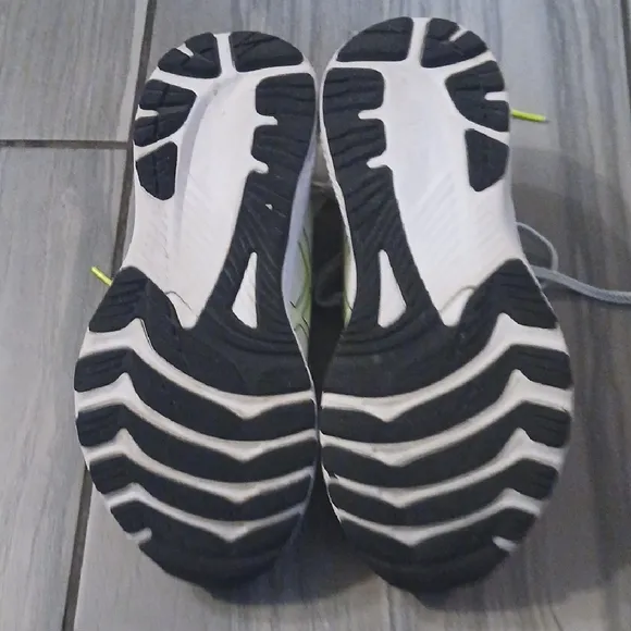 White and Yellow Athletic Shoes