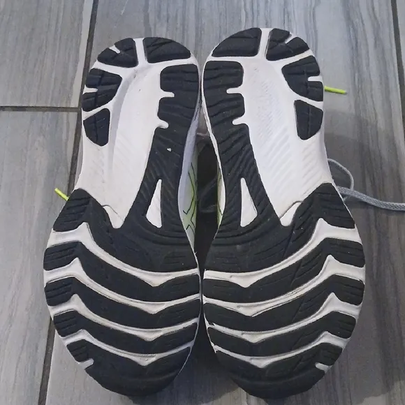 White and Yellow Athletic Shoes
