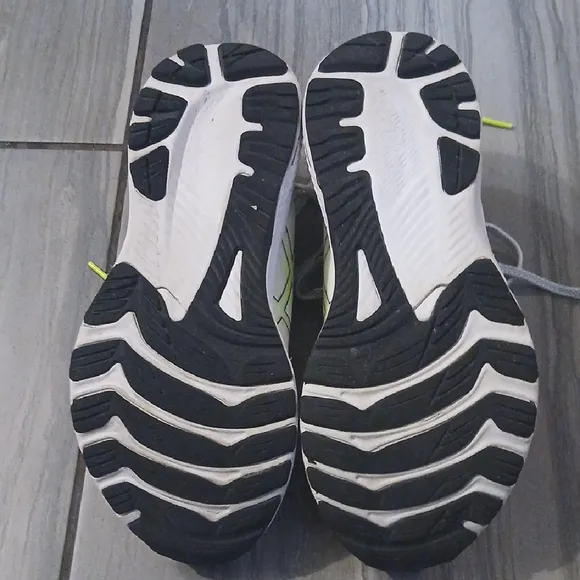 White and Yellow Athletic Shoes
