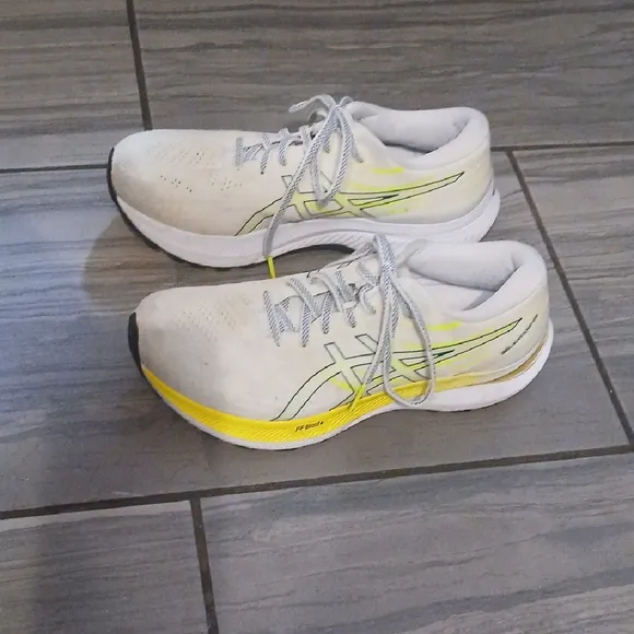 White and Yellow Athletic Shoes