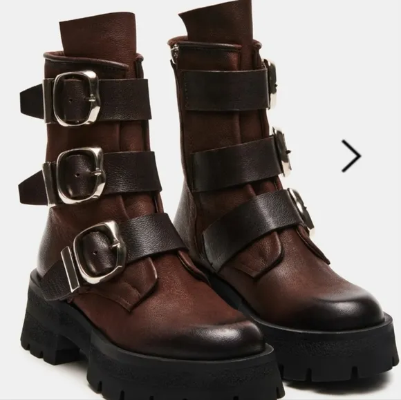 Women lug sole Roland boot side buckles. Made by steve madden size 10 dark brown